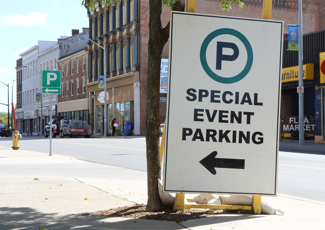 Special event parking fees signage, showing the additional parking regulations in downtown St. Catharines for the upcoming weekend.